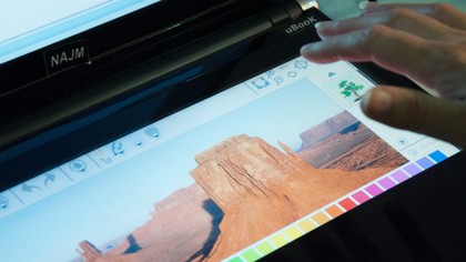 Move the touch controls down onto the touchscreen and you can zoom or paint with your fingers and see tools on the main screen
