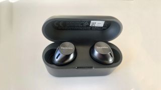 the technics eah-az40 true wireless earbuds in their charging case