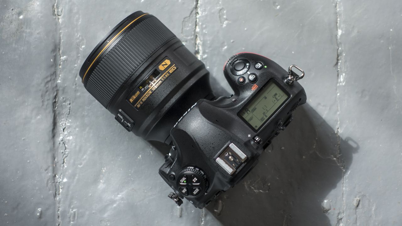 Nikon D850 DSLR camera on a grey surface
