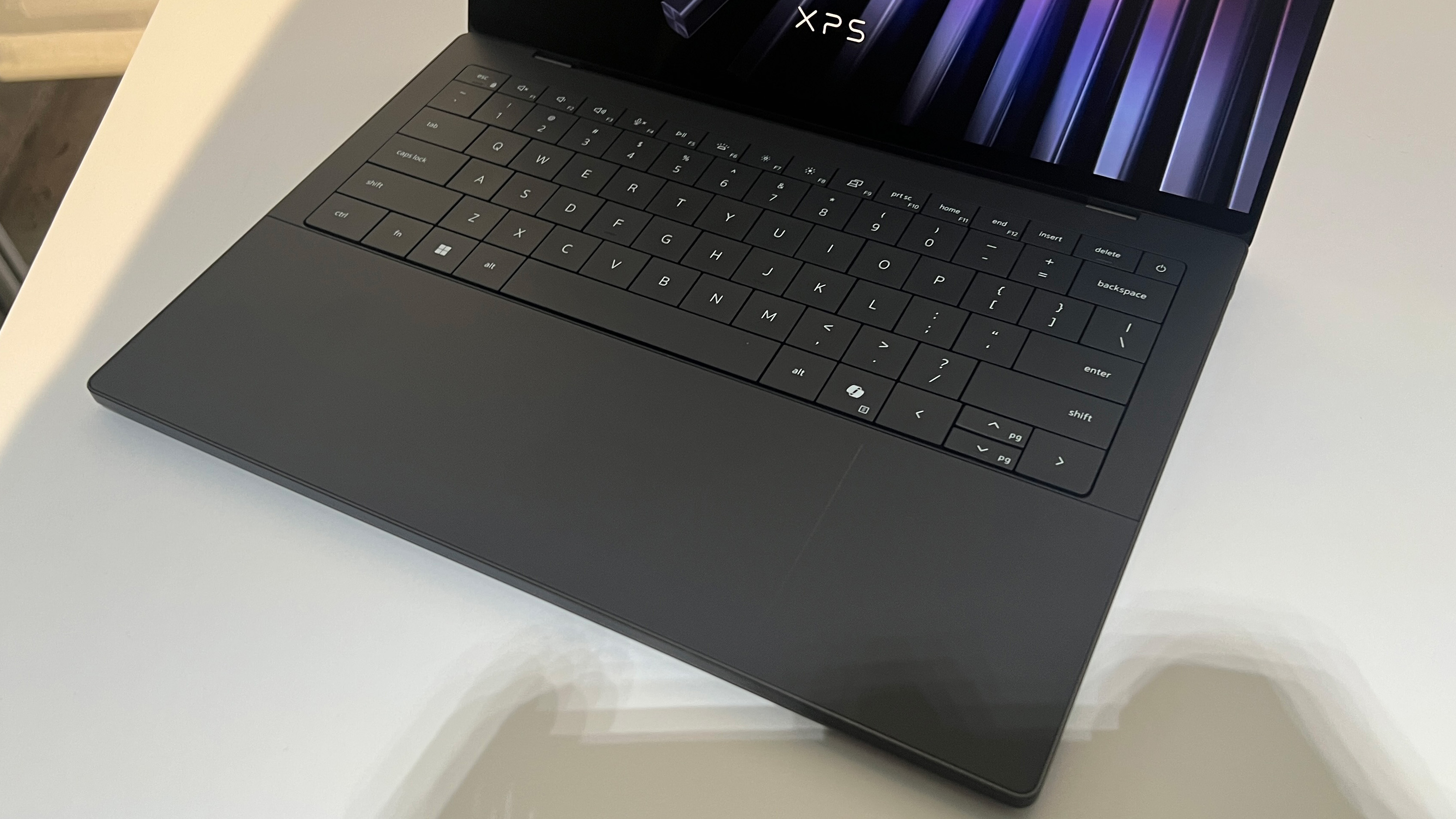 A Dell XPS 14 sitting on display