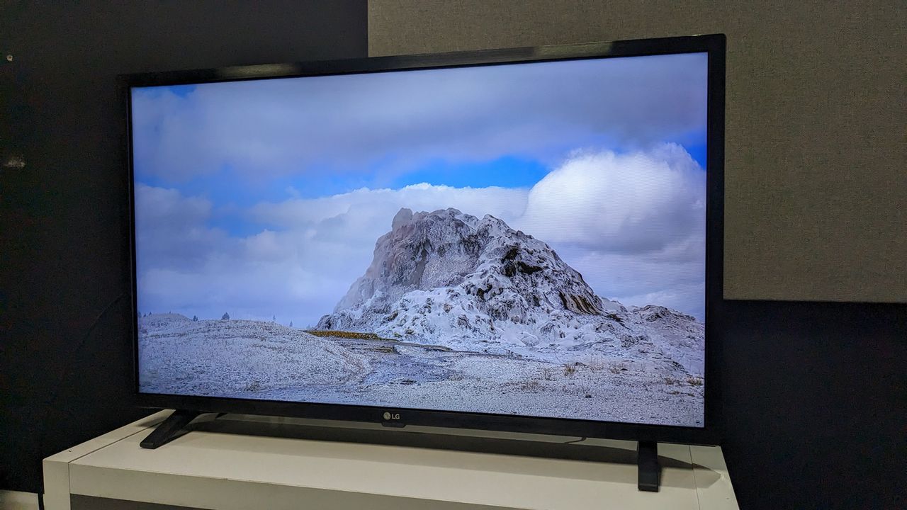 LG 32LQ6300 with rocky landscape on screen
