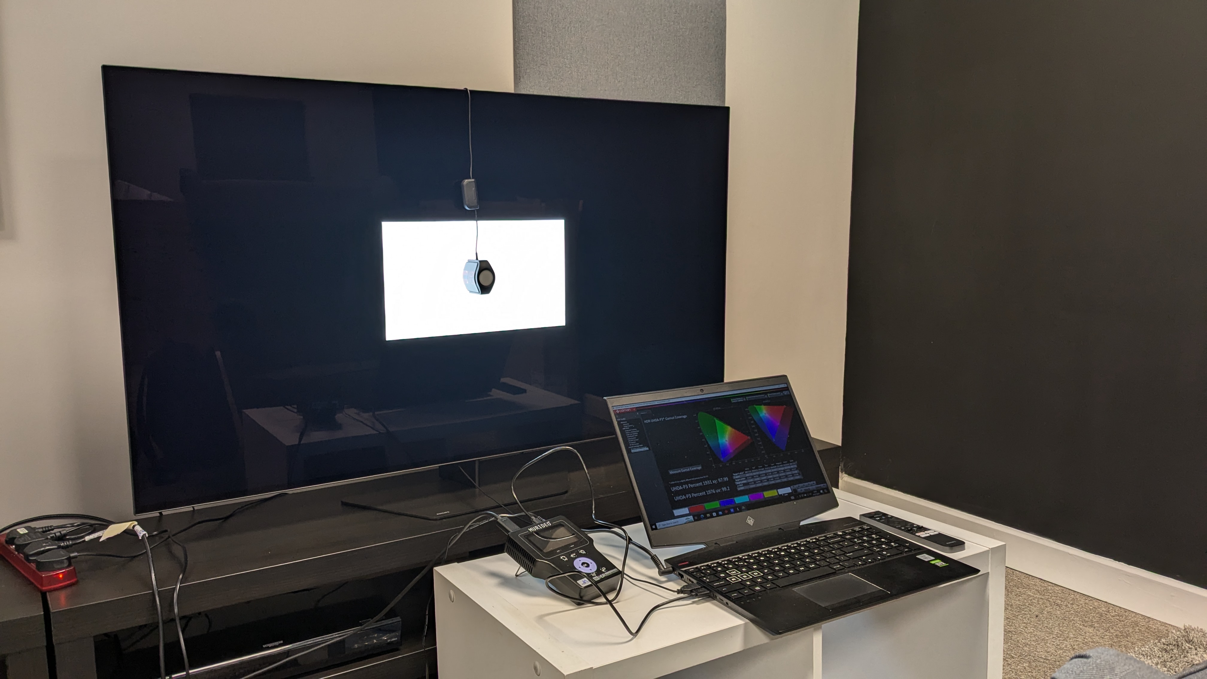Philips OLED809 with testing equipment including Calman