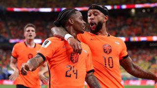 Crysencio Summerville of the Netherlands celebrates with Memphis Depay after scoring his team's fifth goal of the FIFA World Cup 2026 Group F match against Sweden at Houston Stadium on June 20, 2026