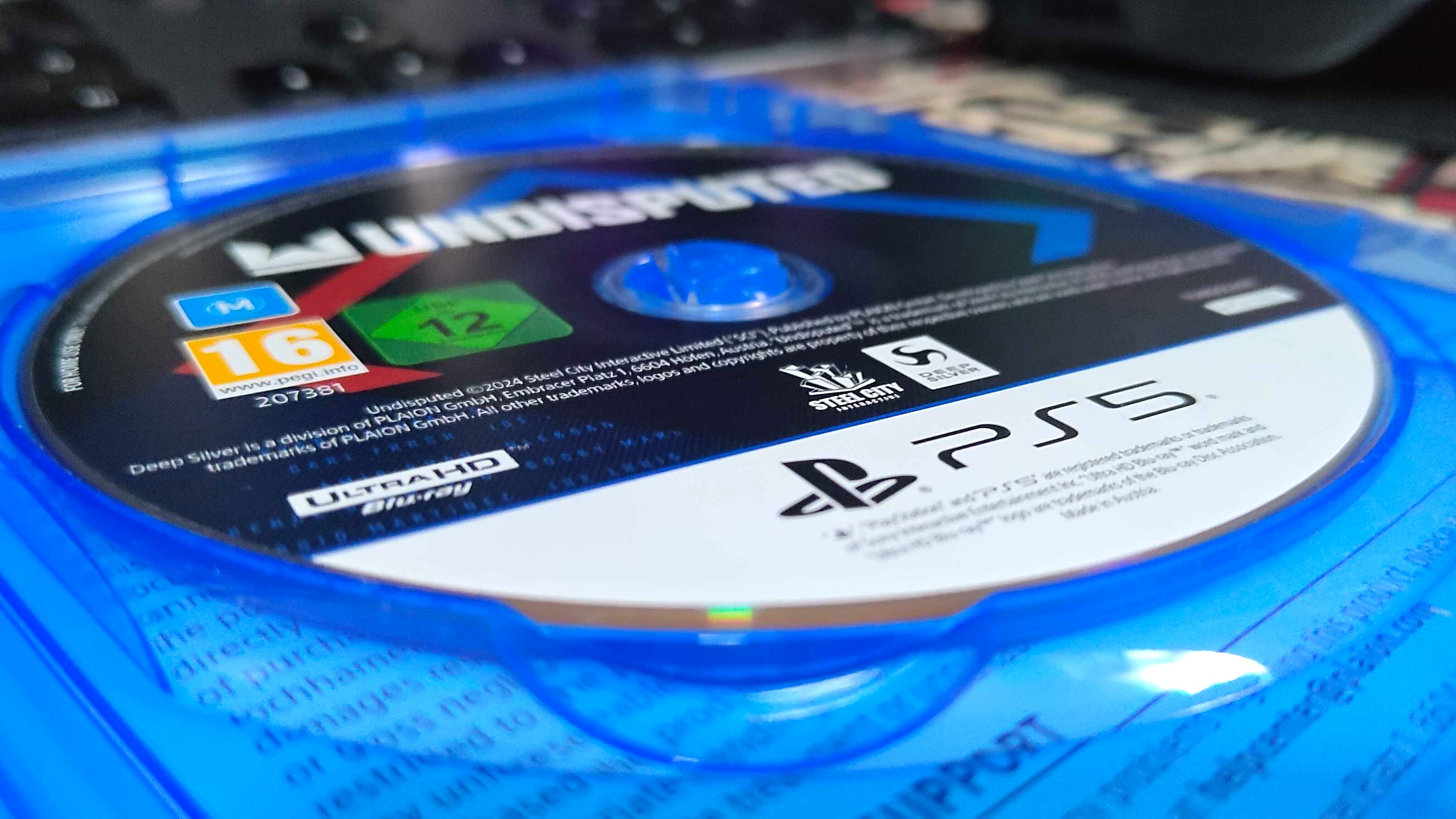 PS5 game disc of Undisputed boxing game in case