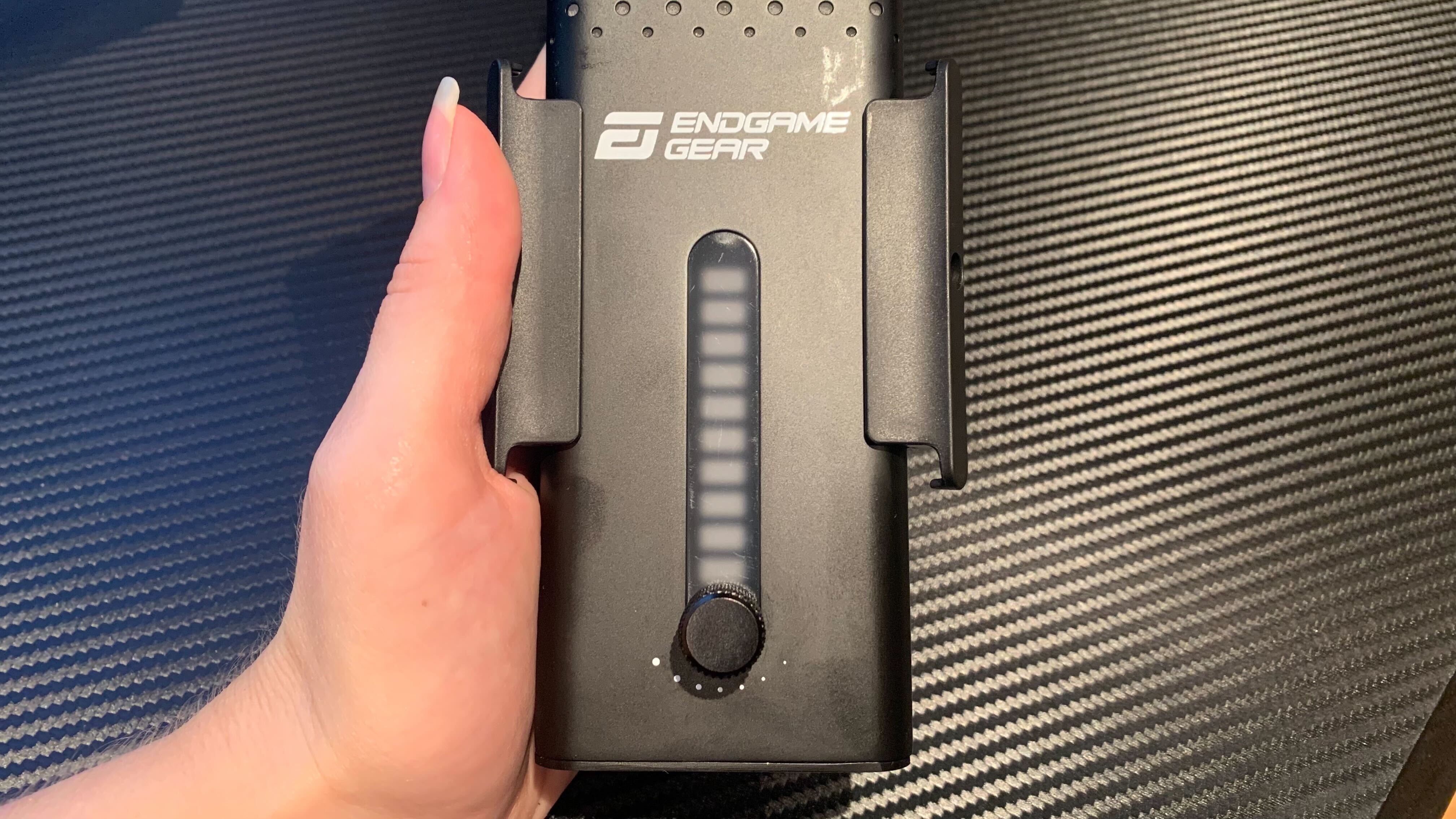 XSTRM USB Microphone out of its stand, showing the gain meter and knob