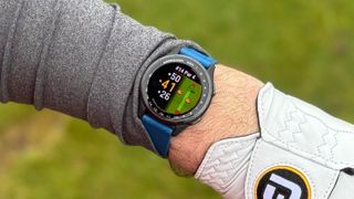 Garmin Approach S50 being worn on the course