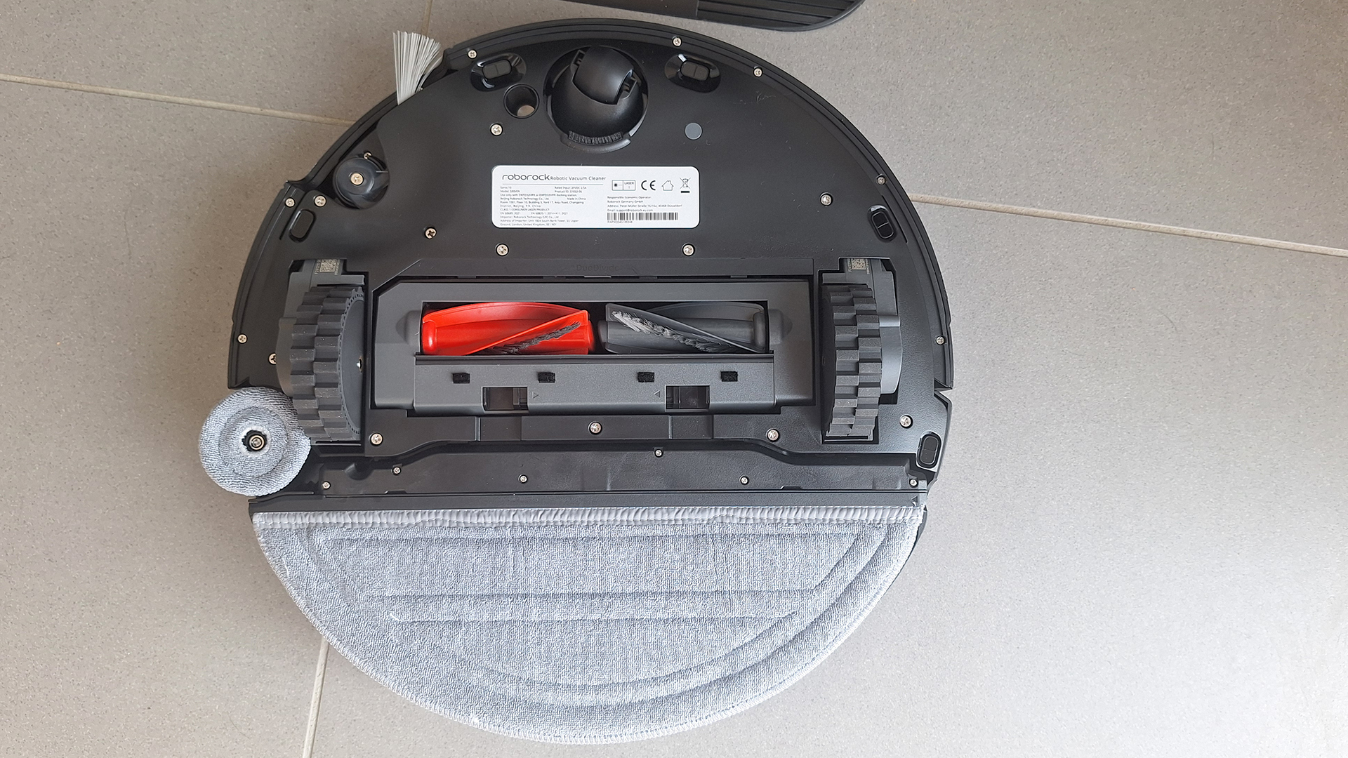 Roborock Saros 10 robot vacuum, flipped over to show underside