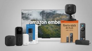A collage of Amazon devices on a grey background, including an Amazon Ember TV, Blink camera, Ring Doorbell, and Fire TV Stick.
