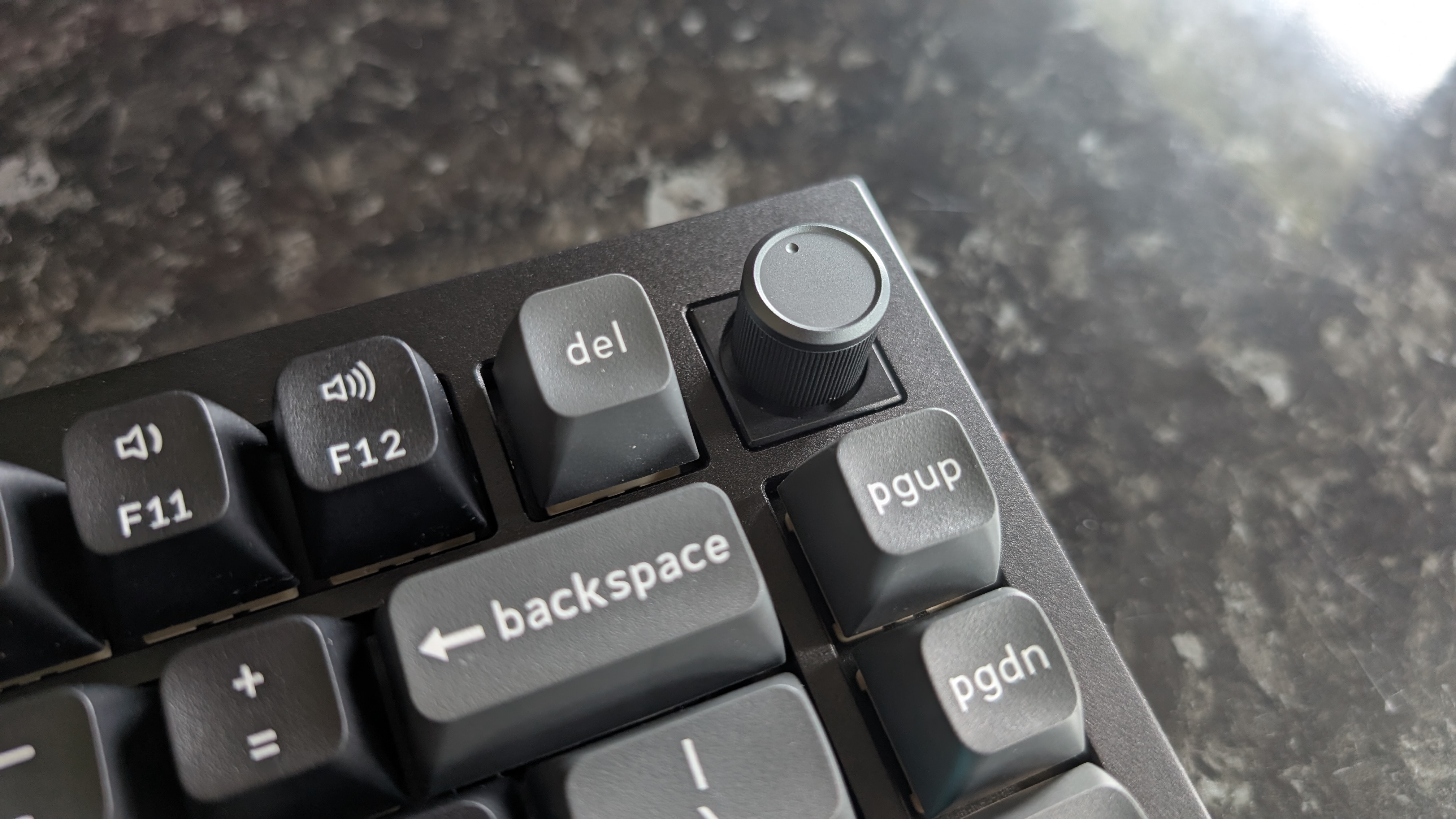 The Keychron Q1 Ultra 8K, photographed on a dark marble worktop.