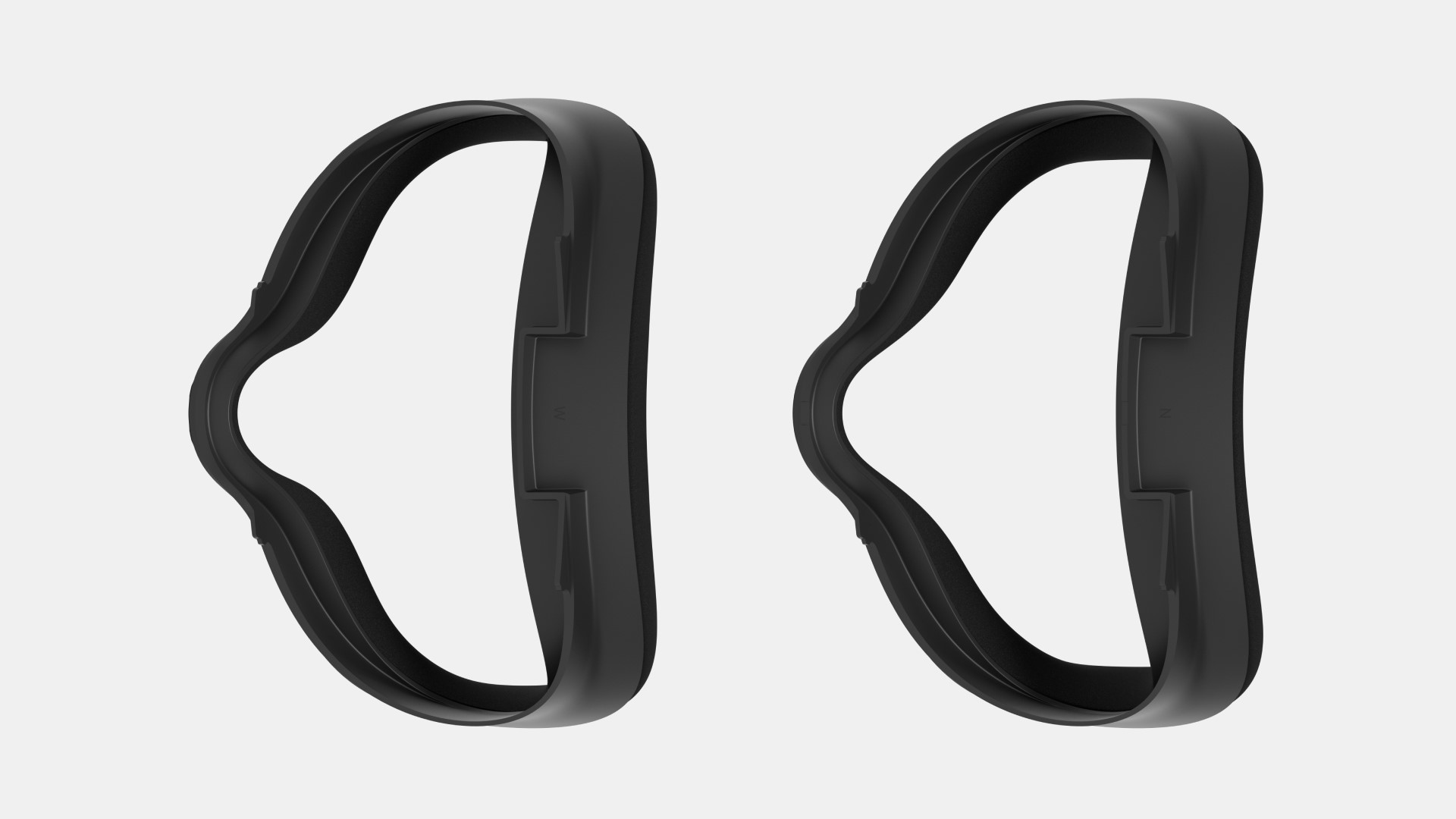 Two plastic inserts that are used to make the Quest 2 headset fit better
