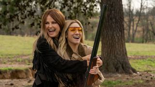 Margo and Sophie hug and smile in The Hunting Wives