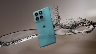 The Motorola Edge 60 Fusion in a render with water splashing it