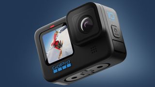 The GoPro Hero 10 Black action camera on a blue background