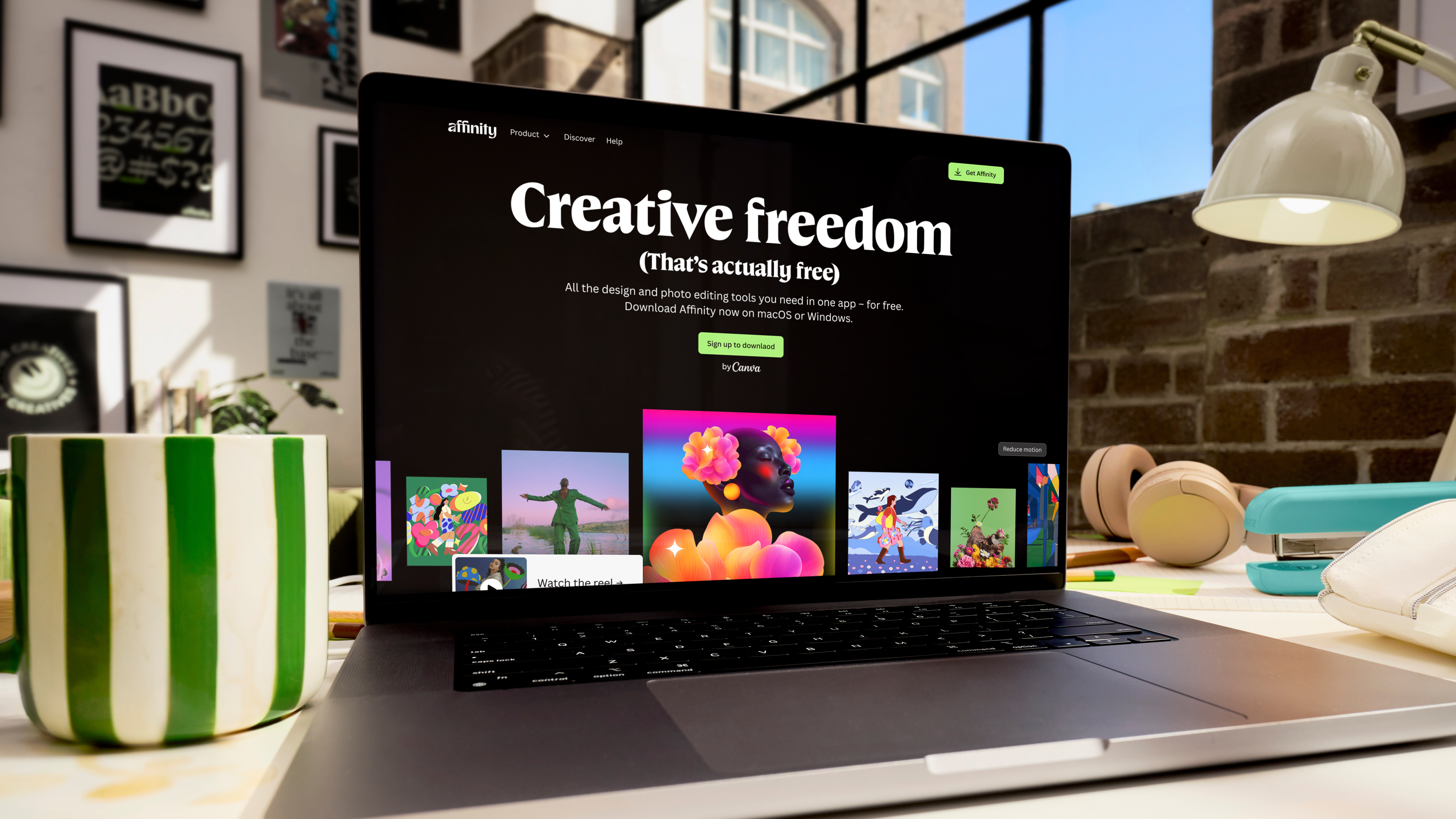 The Affinity website homepage on a MacBook in a home office
