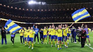Players of Sweden celebrate their victory following the FIFA World Cup 2026 European Qualifiers KO play-offs match between Sweden and Poland 