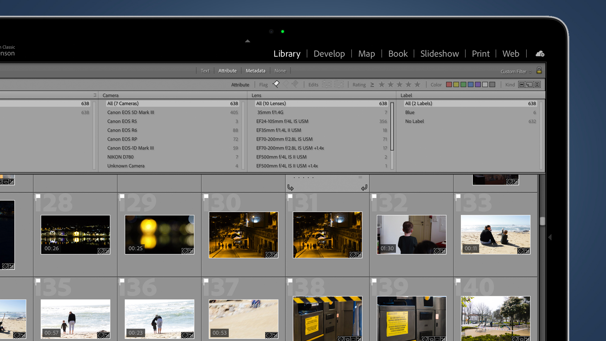 Laptop screen showing Lightroom library module