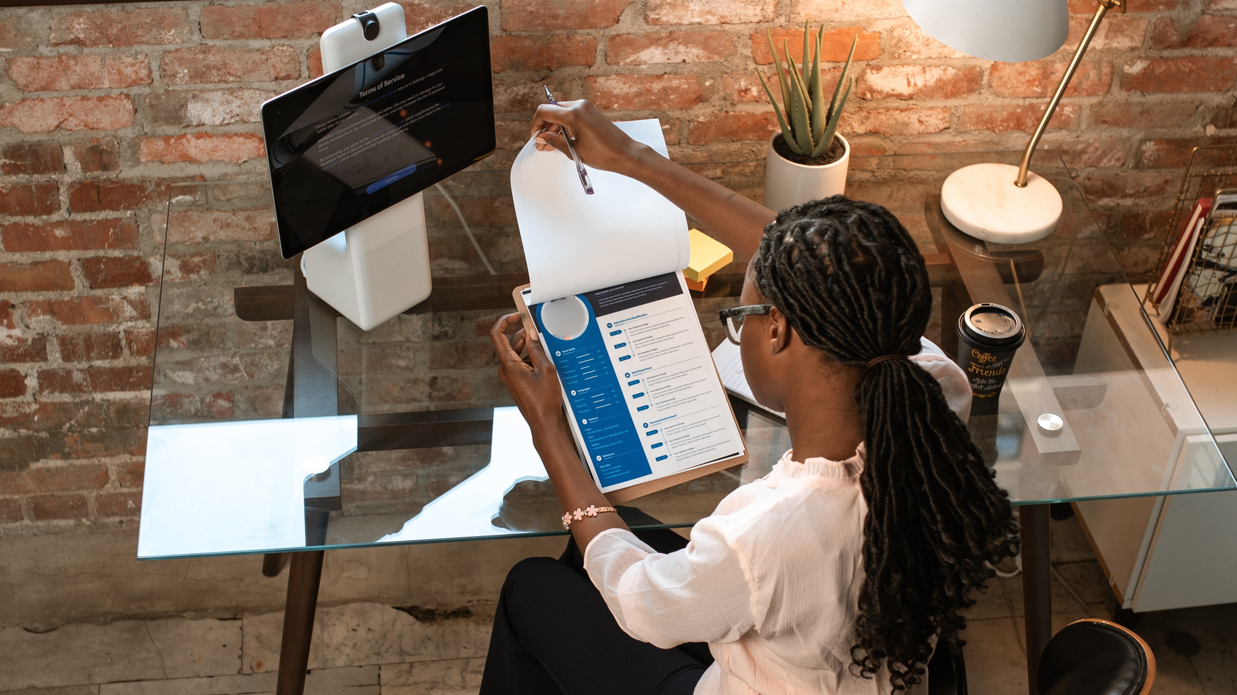 Woman Reviewing a Resume