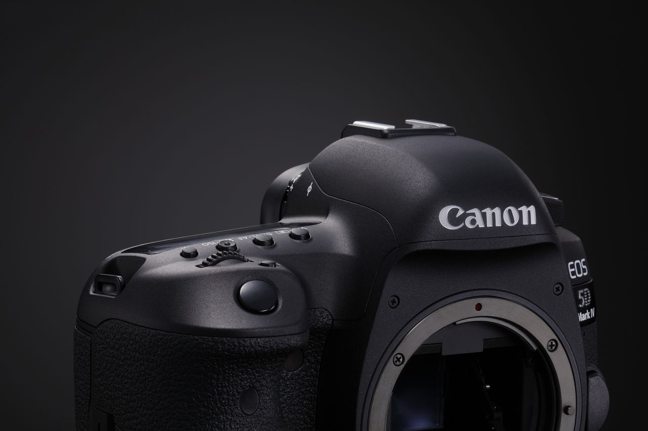 Canon EOS 5D Mark IV DSLR camera on black background