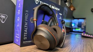 The Turtle Beach Stealth Pro 2 wireless gaming headset on a wooden desk