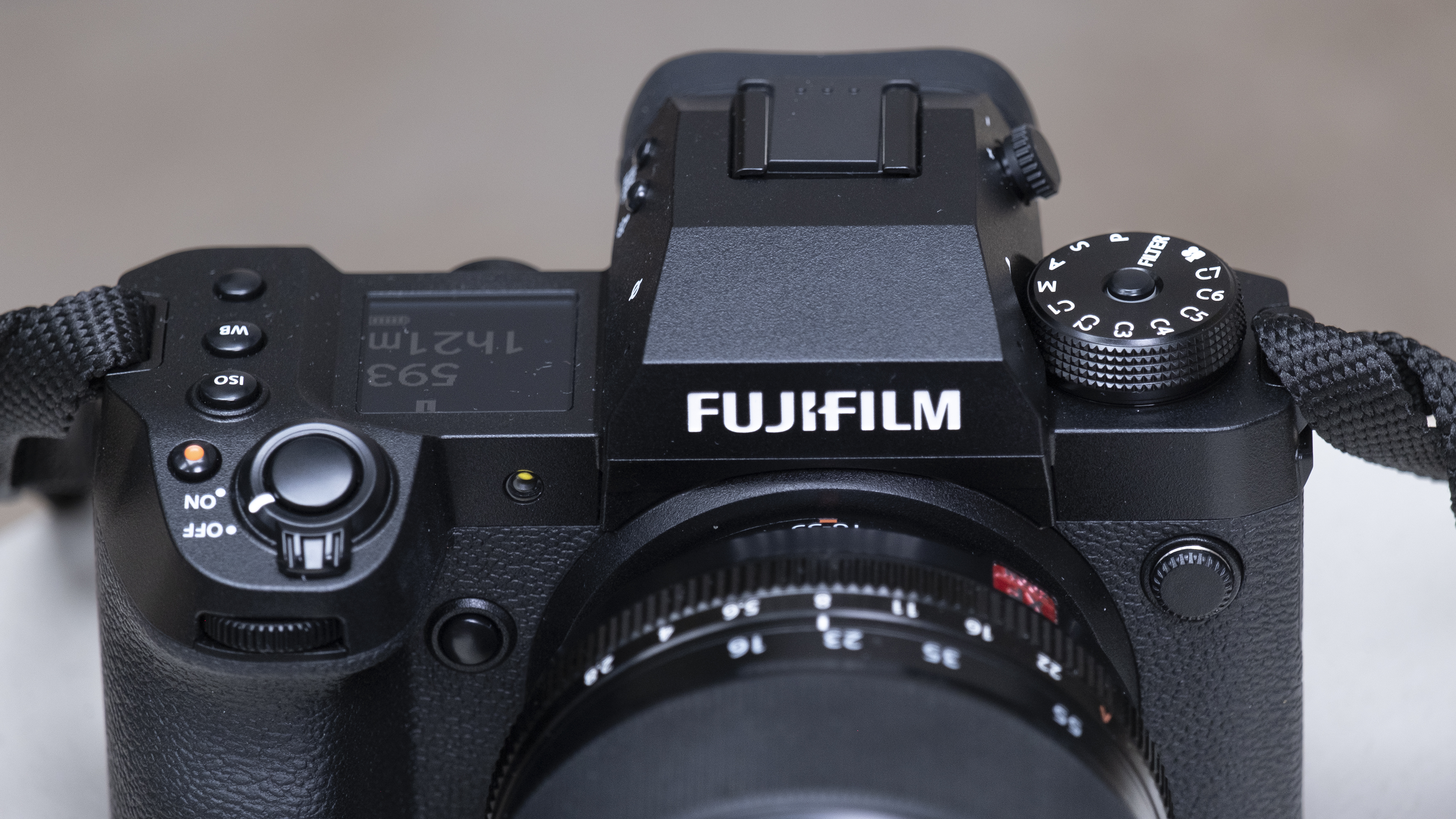 The Fujifilm X-H2 camera setting on a white table