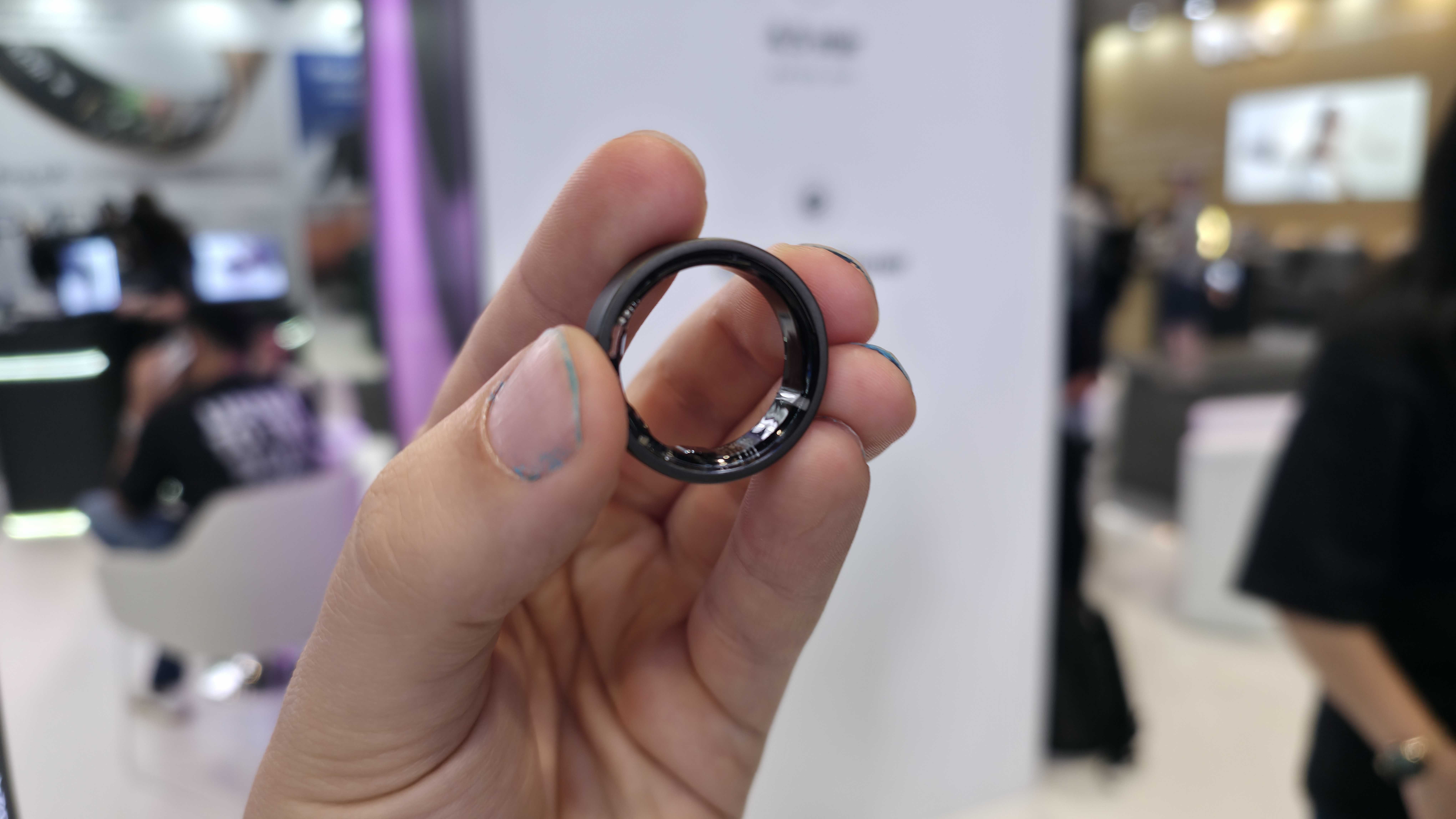The Luna Ring 2.0 held in a man's hand at IFA