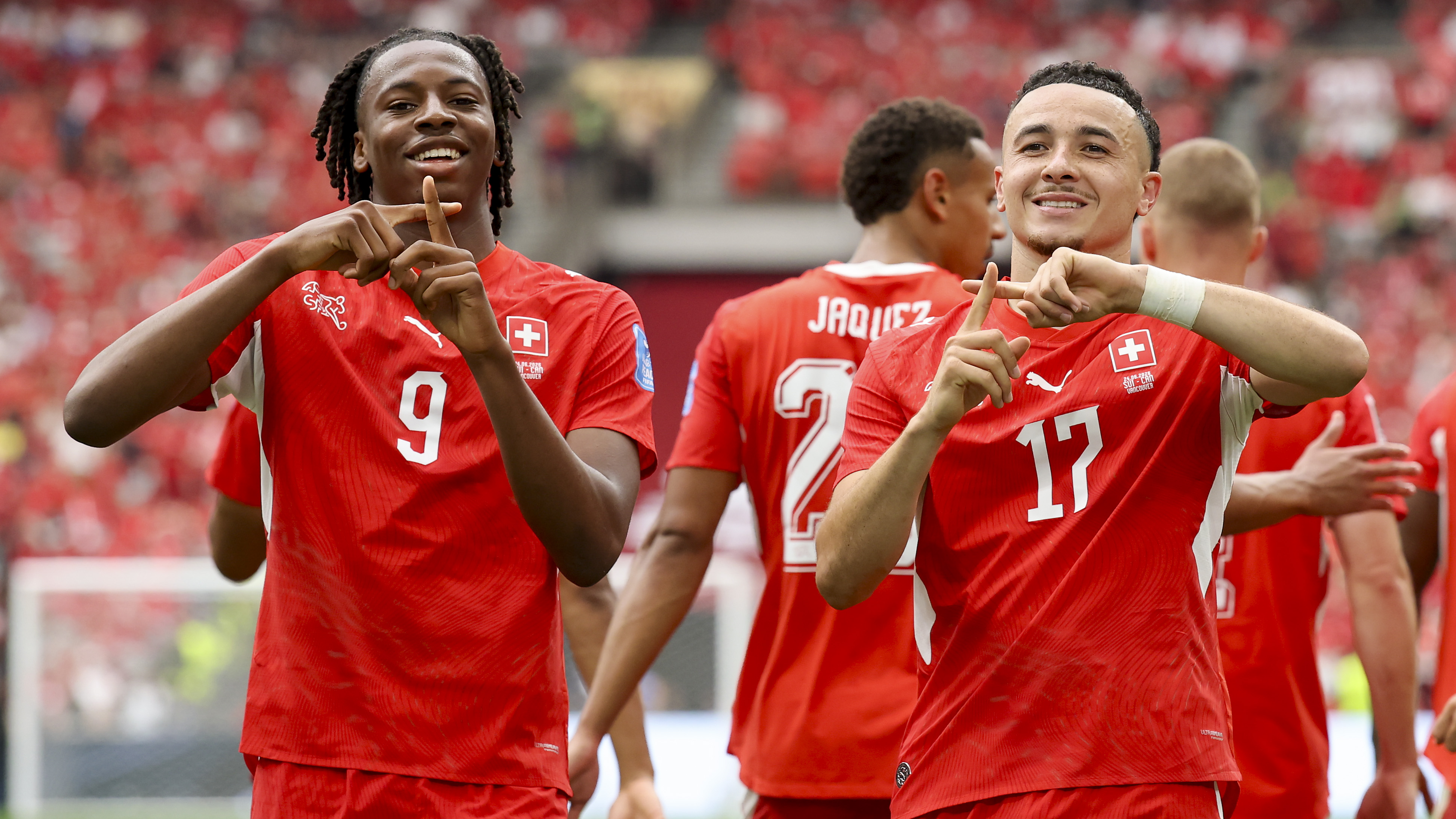 Ruben Vargas #17 of Switzerland celebrates with teammate Johan Manzambi #9 scoring his team's first goal during the FIFA World Cup 2026 Group B match between Switzerland and Canada