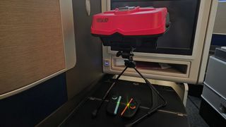 The Virtual Boy on a United flight's tray table