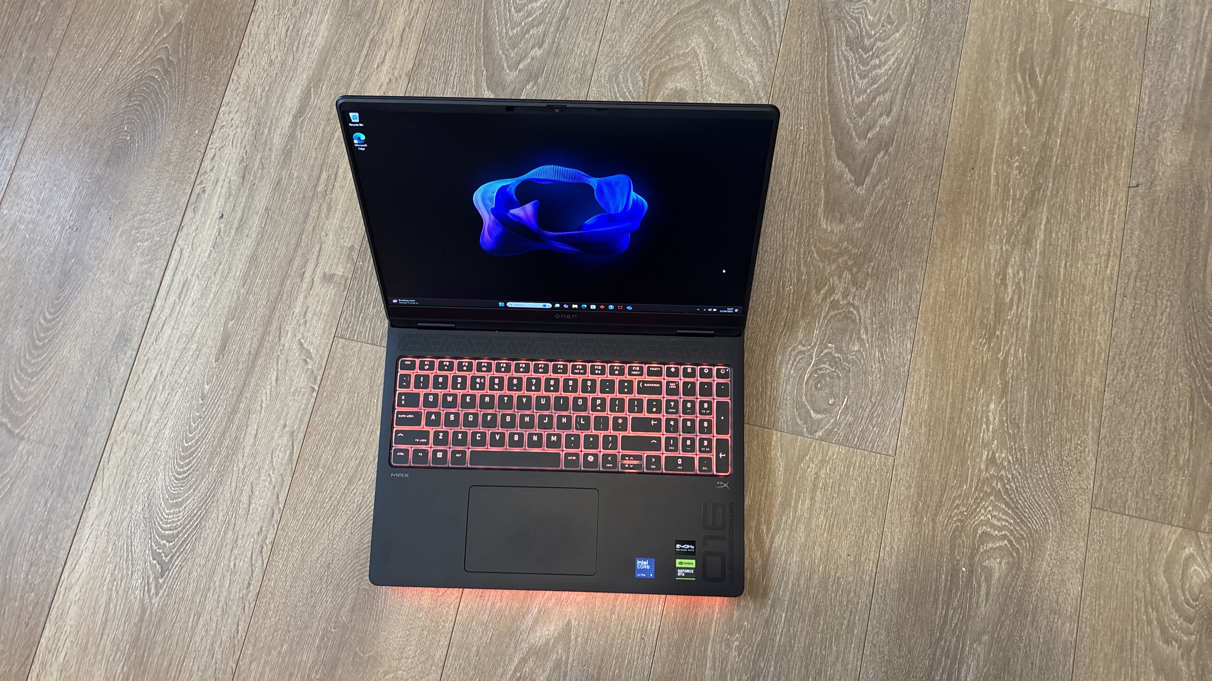 HP Omen Max 16 gaming laptop on wooden surface