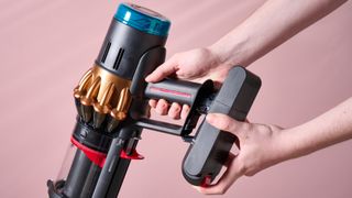 Dyson V16 Piston Animal cordless stick vacuum having its battery removed