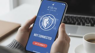 Person holding a phone that shows a VPN that is not connected