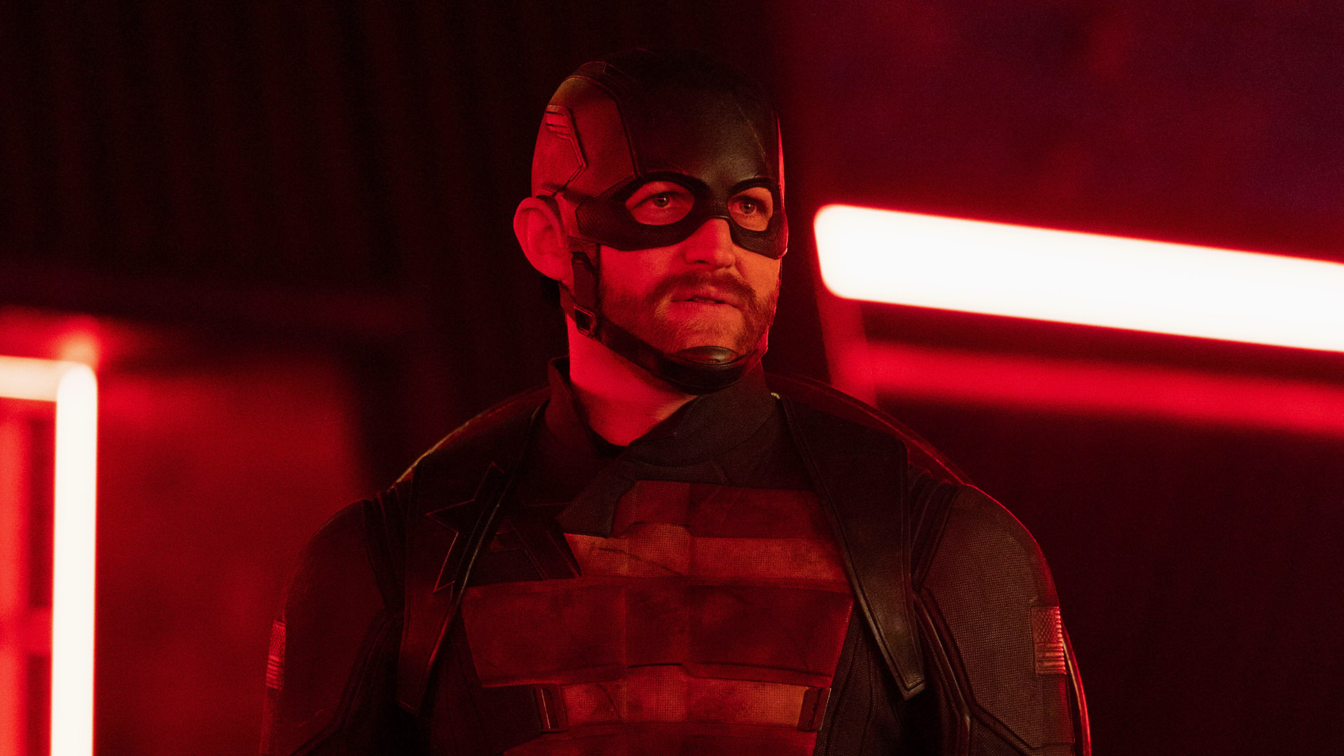 John Walker/US Agent bathed in red light in Marvel's Thunderbolts* movie