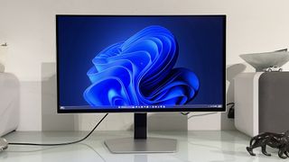 Samsung Odyssey OLED G6 G60SF monitor on a desk in a home office