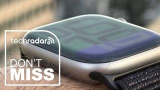 A close up of the Apple Watch Series 11 on a wrist with a deals tag overlapping