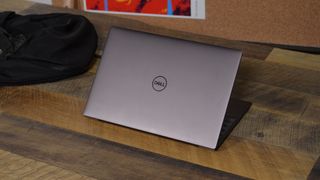A Dell XPS 13 (2022) on a wooden table