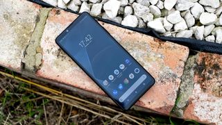 The Sony Xperia 10 III resting on a wall