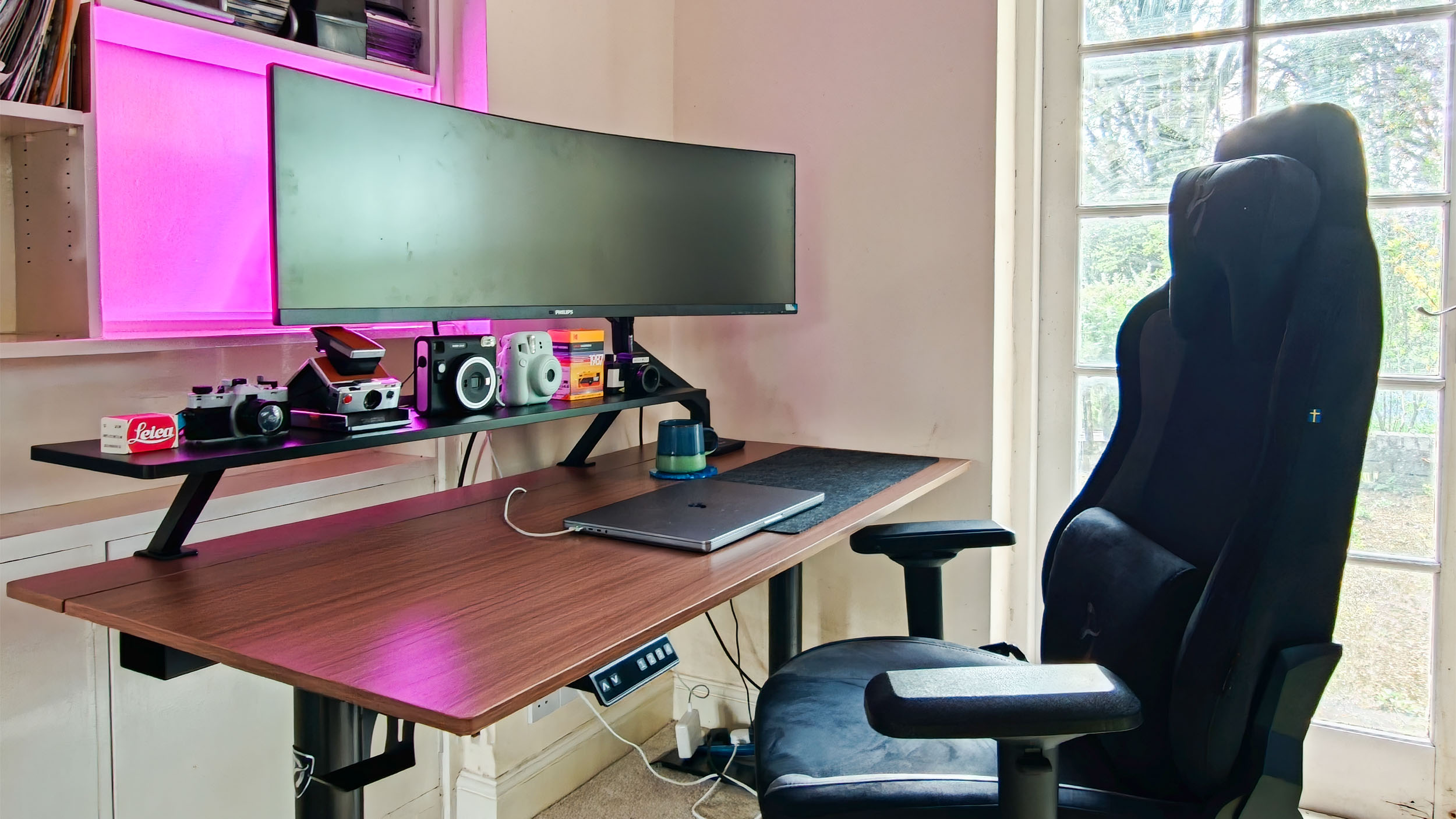 The Arozzi Arena Nordico Electric Standing Desk, freshly assembled, in home office room