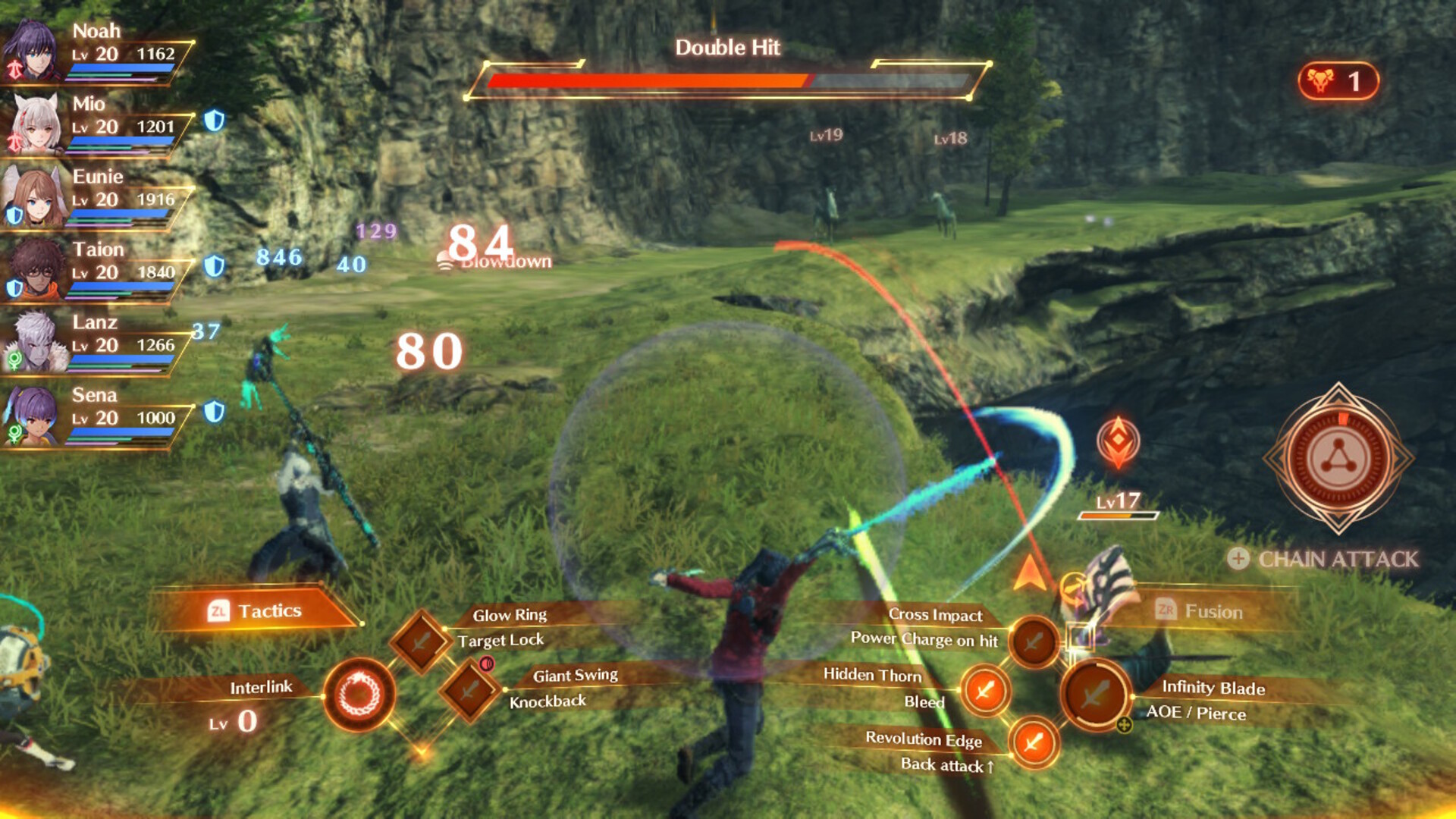 two characters fight smaller monsters in a field.