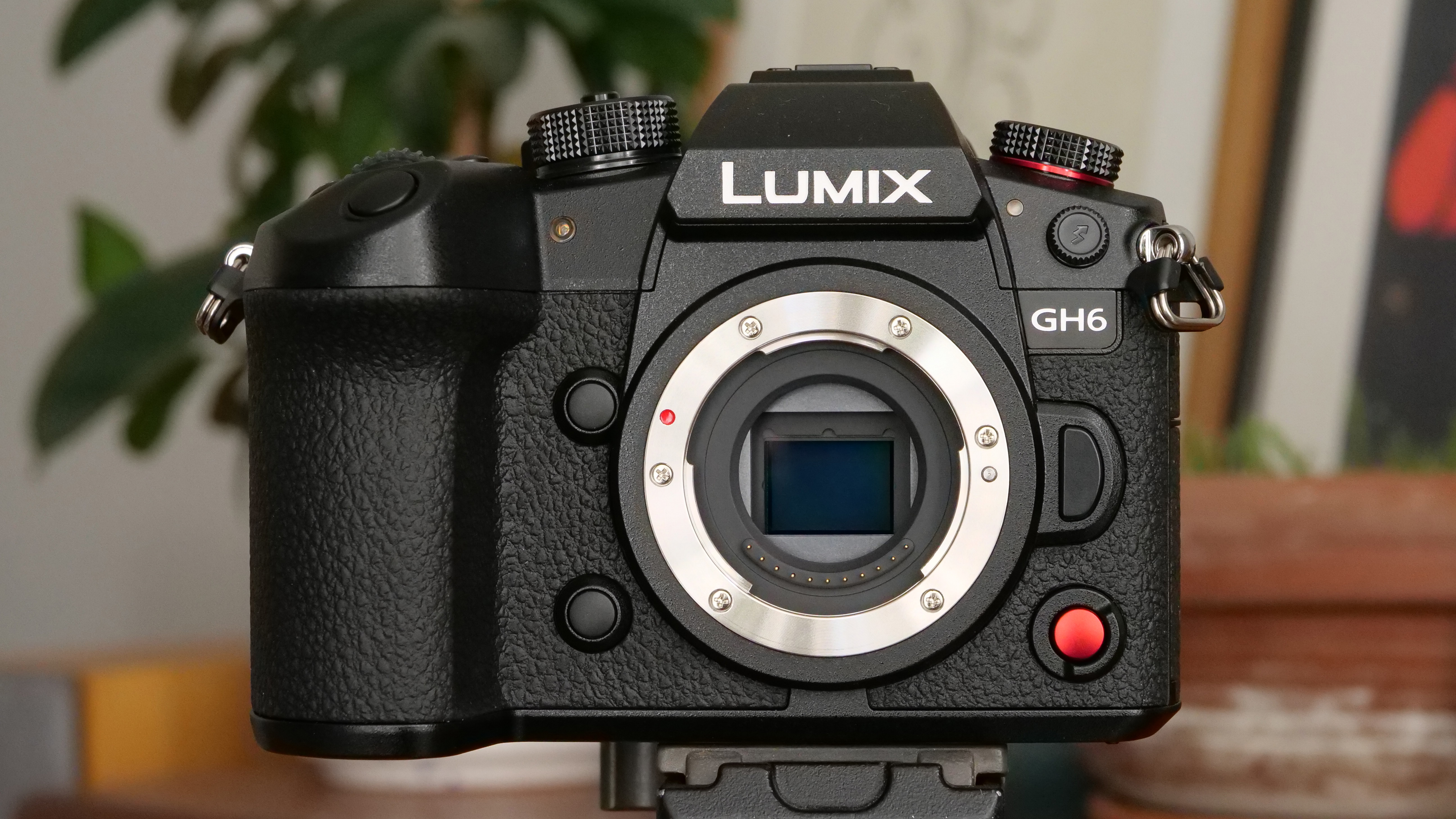 The Panasonic GH6 camera sitting on a tripod