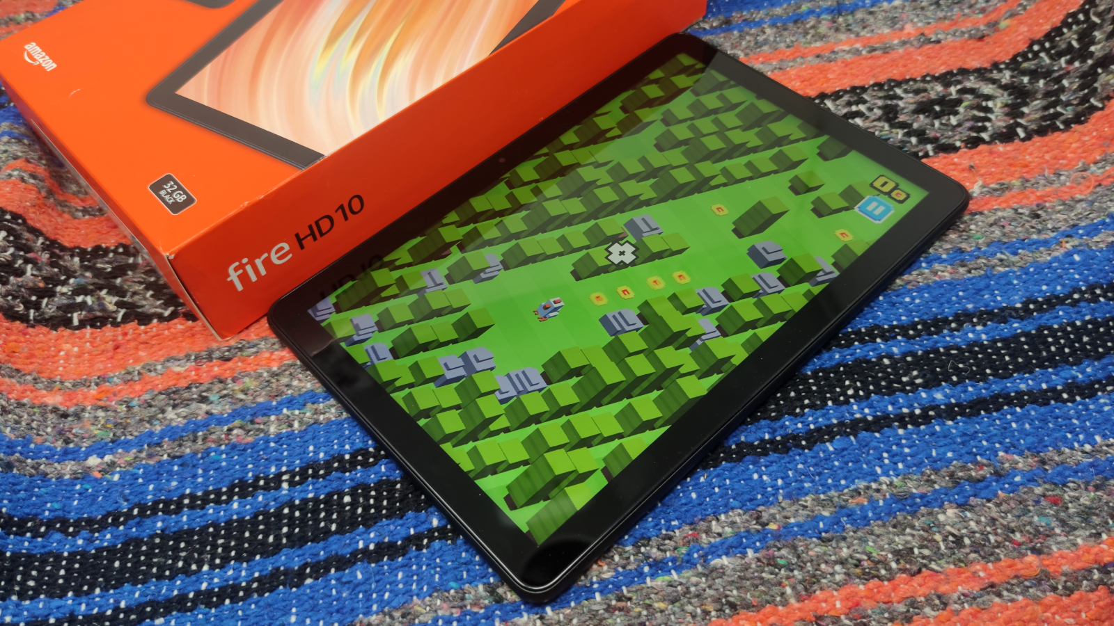 The Amazon Fire HD 10 (2023) on a colored background.