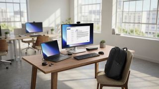 Dell Pro 7 laptop on a desk, connected to a docking station, with a monitor and keyboard
