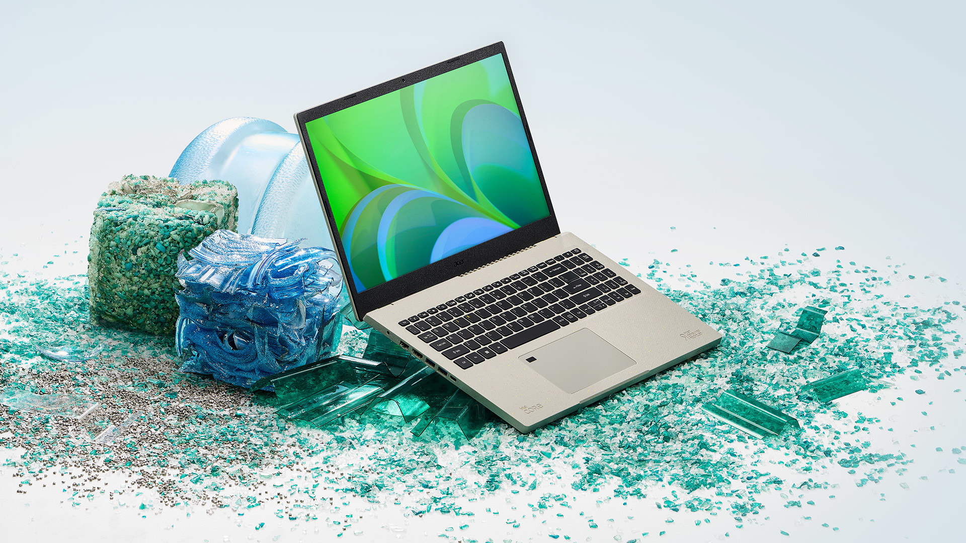 The Acer Vero laptop resting on a pile of recycled plastic