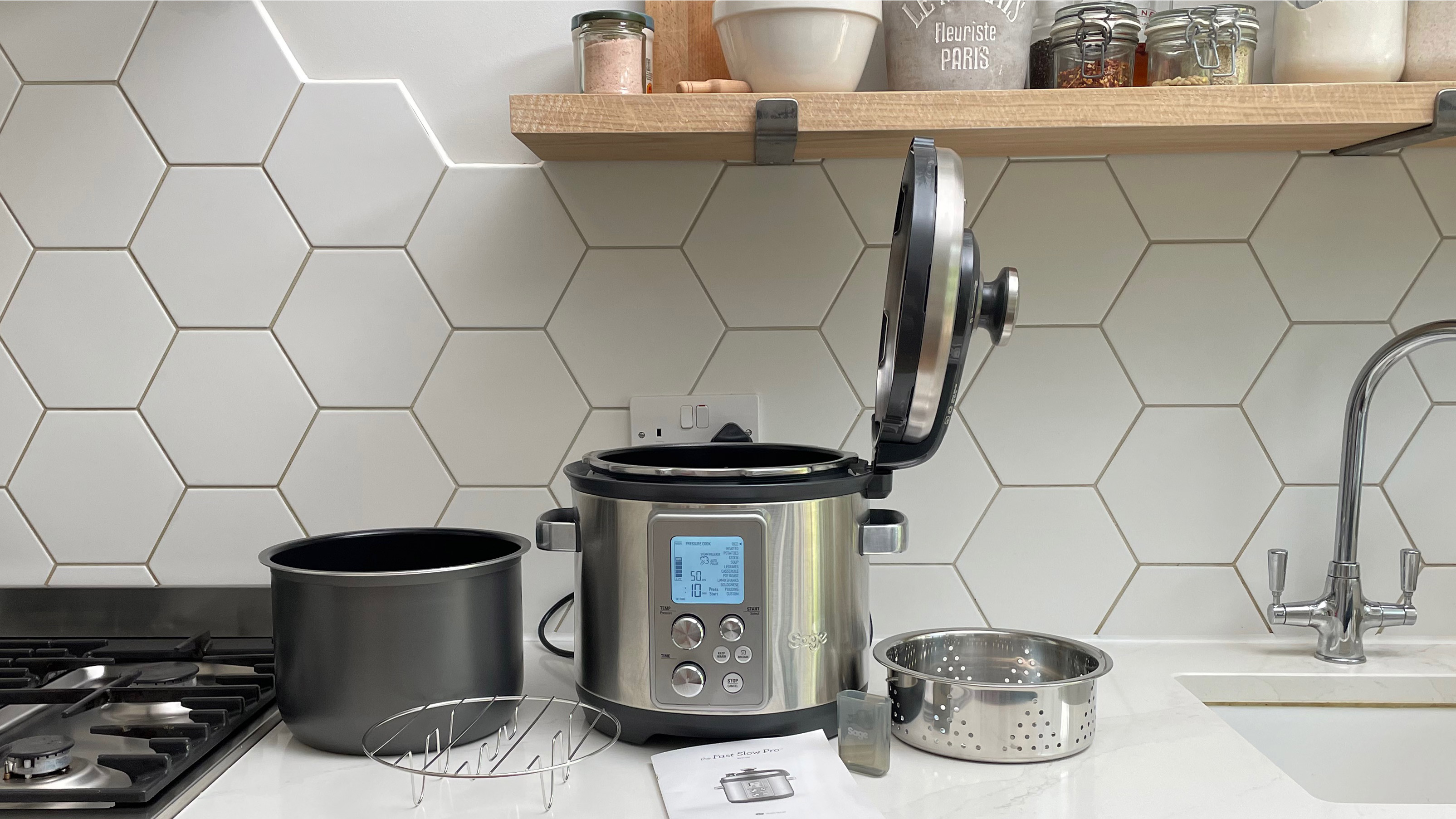 Breville the Fast Slow Pro with the lid open, on a kitchen cuntertop