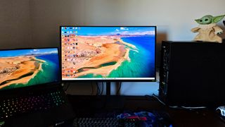 Gigabyte MO32U24 gaming monitor on a desk