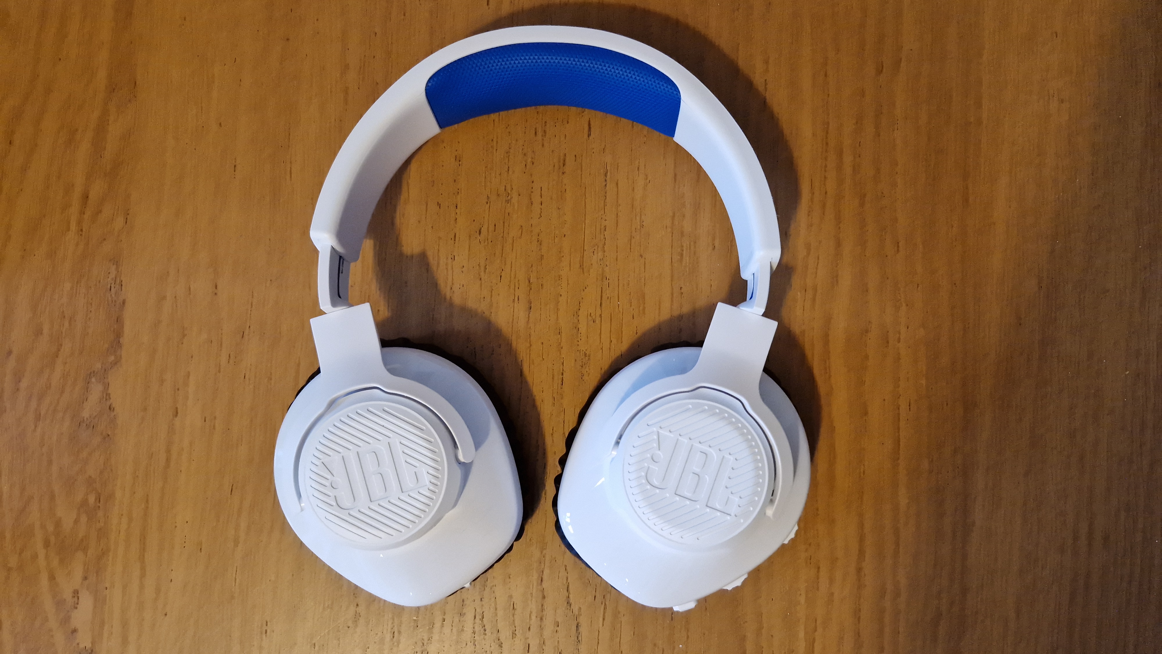 Profile and detail shots of the JBL Quantum 360P wireless gaming headset