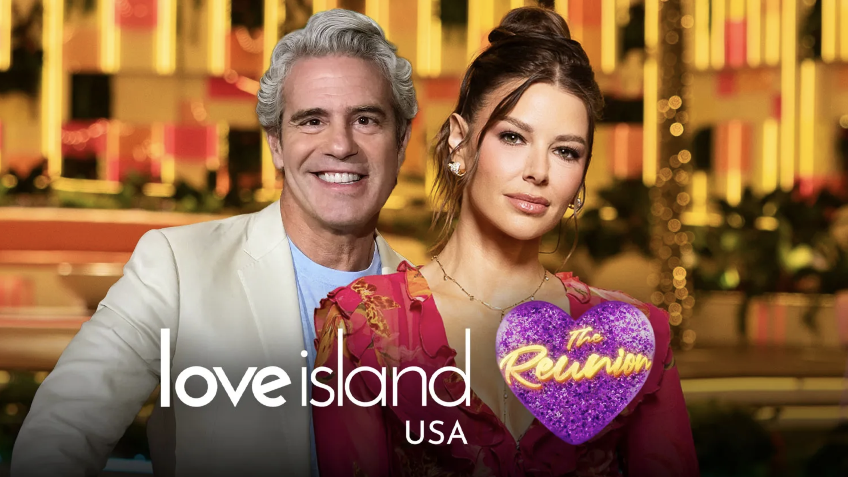 Bravo's Andy Cohen in linen jacket and host Ariana Madix smiling to promote the Love Island USA reunion 2026 