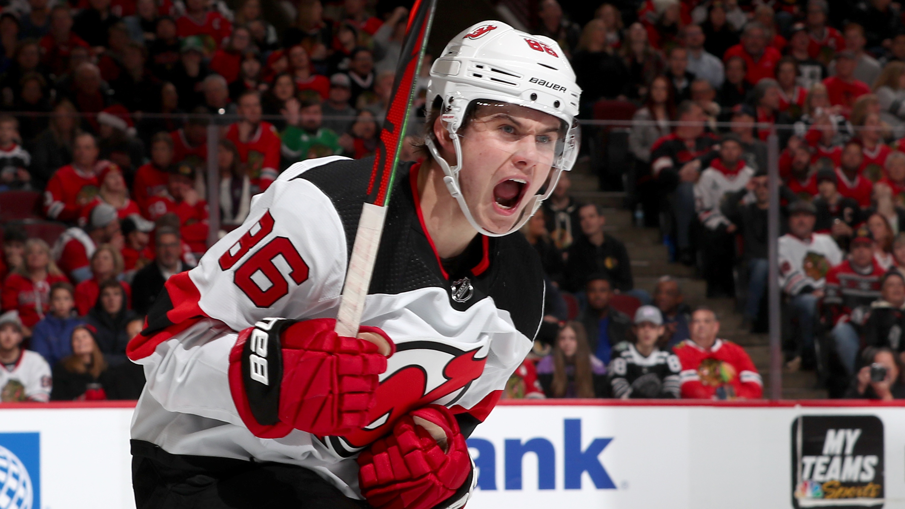 Jack Hughes #86 of the New Jersey Devils reacts after scoring 