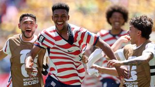 Alex Freeman of the United States celebrates with teammates after scoring his team's second goal in the FIFA World Cup 2026 Group D win over Australia at Seattle Stadium on June 19, 2026 in Washington