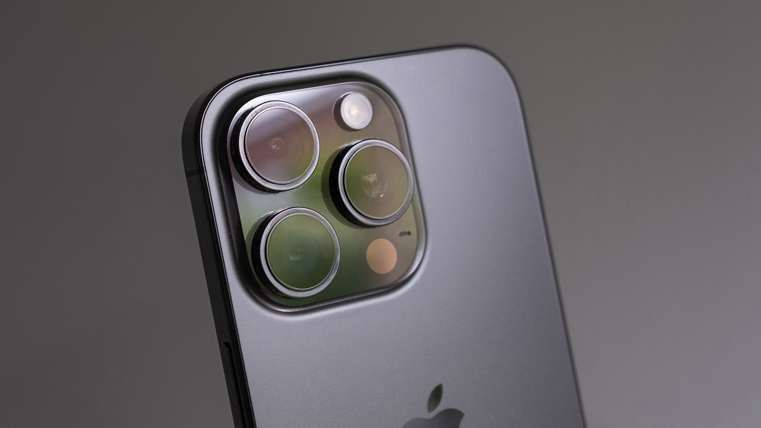 The iPhone 16 Pro on a grey background