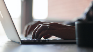 Person using a PDF editor on a laptop