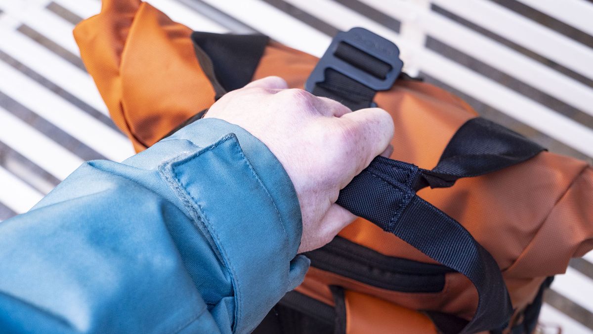 Wandrd PRVKE V4 bag on a white metal bench
